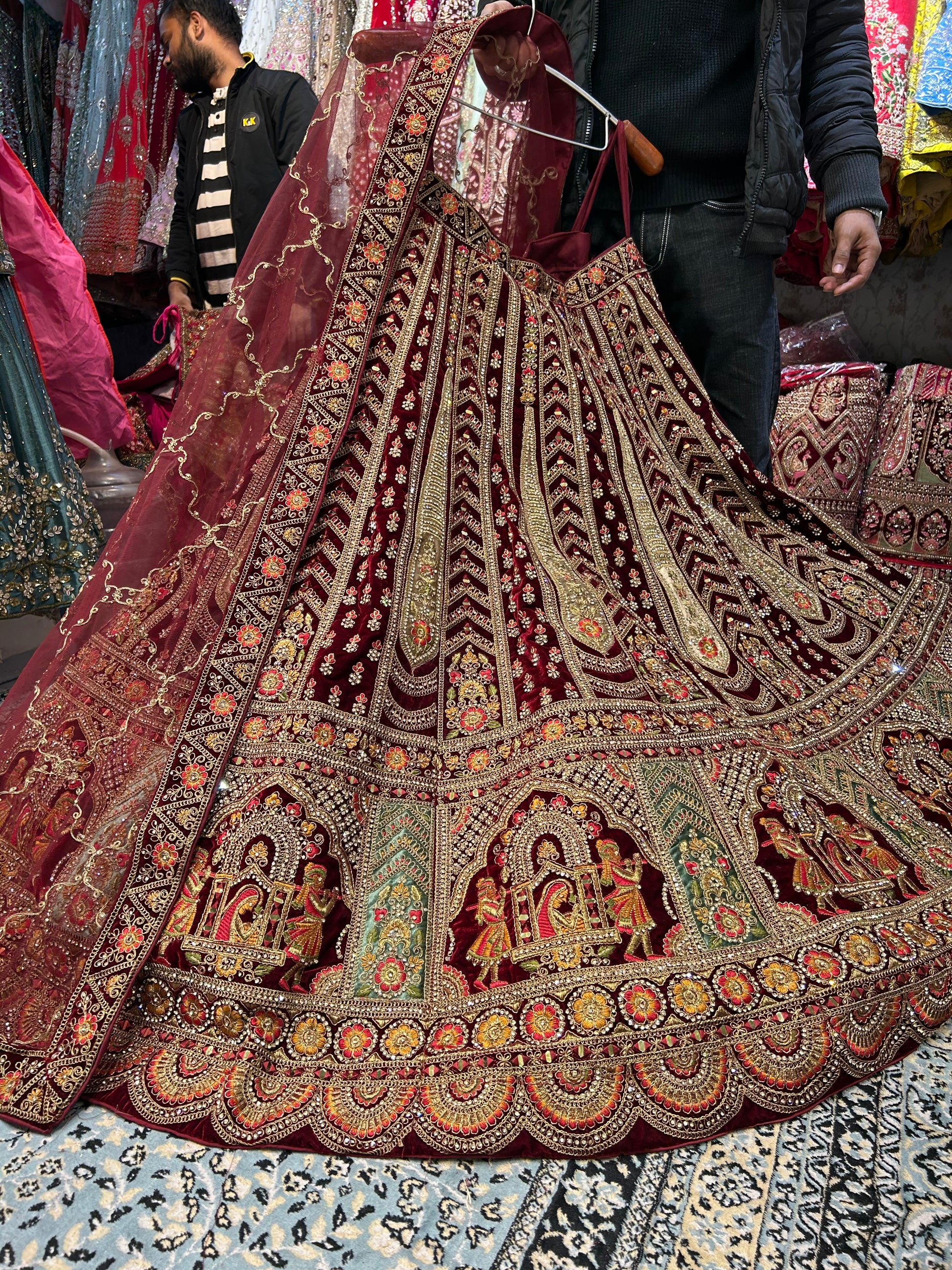 Cute maroon Doli Barat bridal lehenga