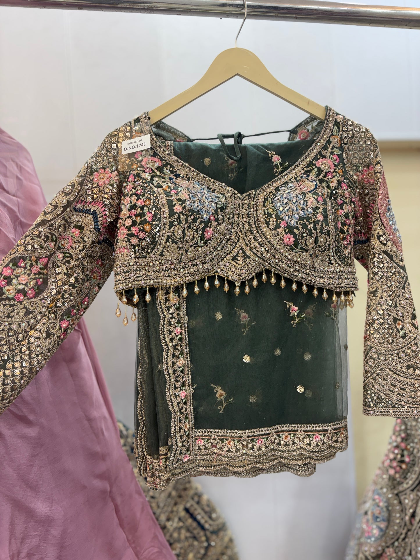 Fantastic beige peach circle peacock crop top Lehenga