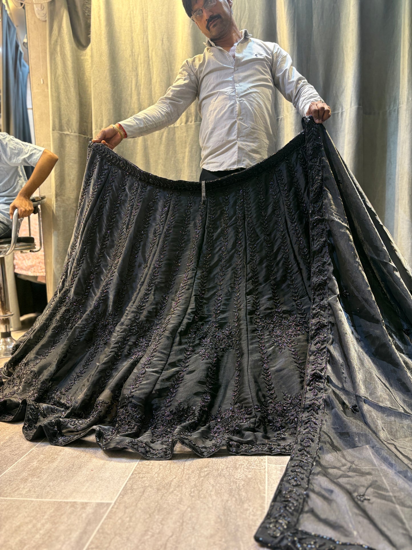 Lavishing black on black monotone handwork Lehenga