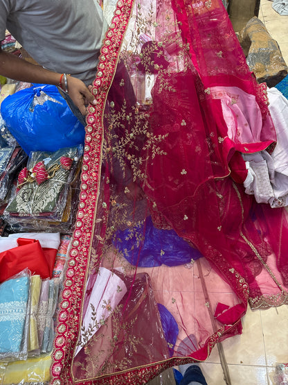 Tremendous Rani pink peacock Jaal Duptta Bridal Lehenga