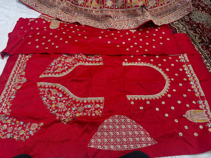 Tremendous red peacock bridal Lehenga