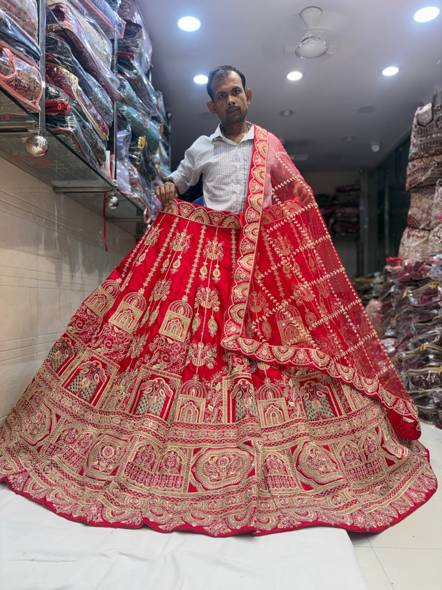 Delightful Rani pink peacock Bridal Lehenga
