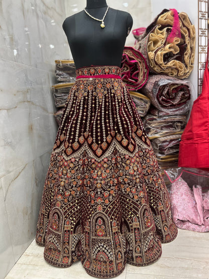 Lovely maroon jhumka ball bridal lehenga