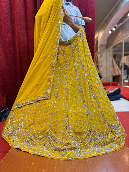 Pretty yellow haldi mehendi handwork Lehenga