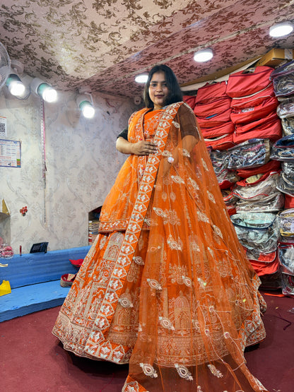Lovely orange handwork peacock bridal Lehenga