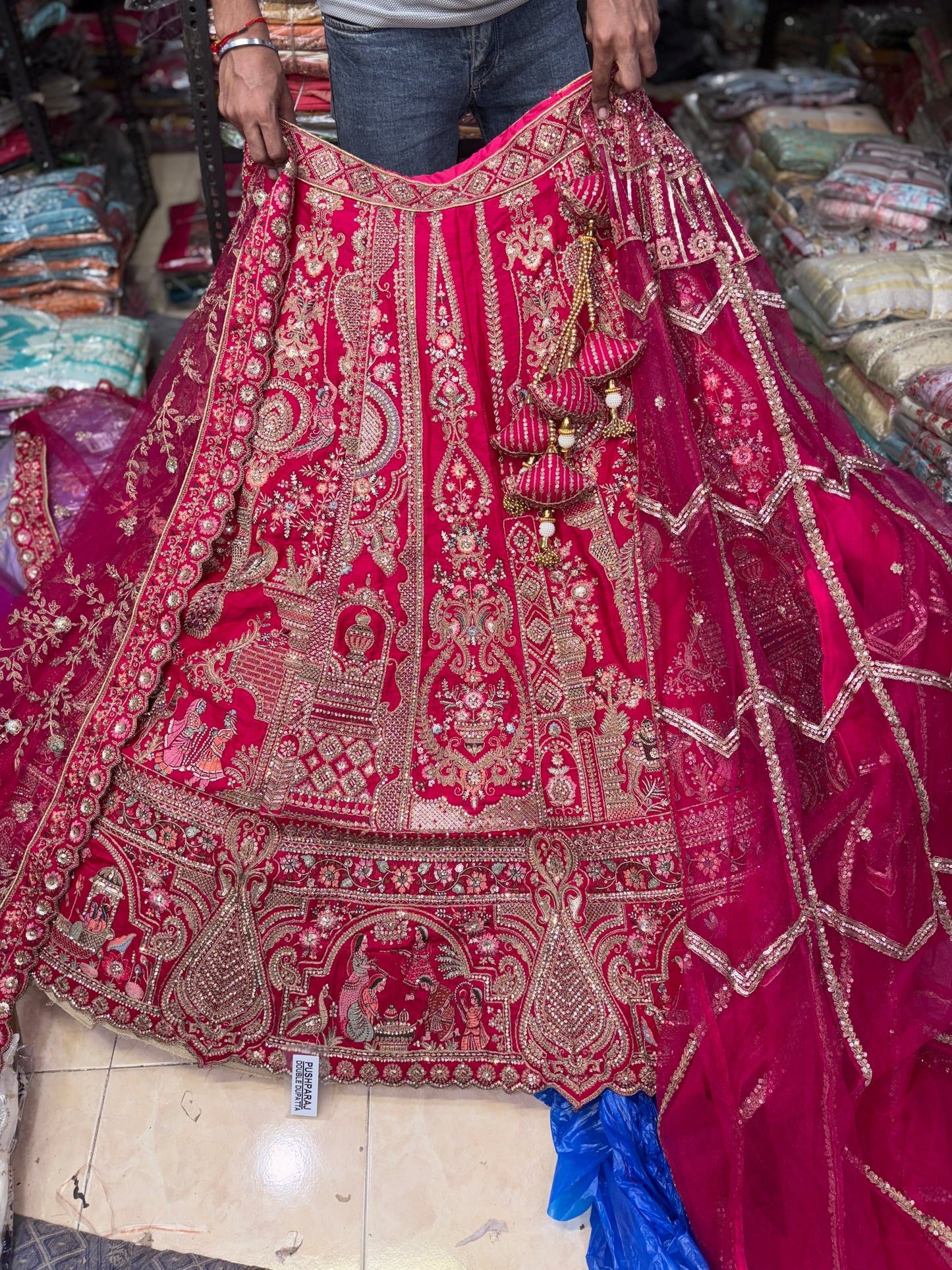 Tremendous Rani pink peacock Jaal Duptta Bridal Lehenga