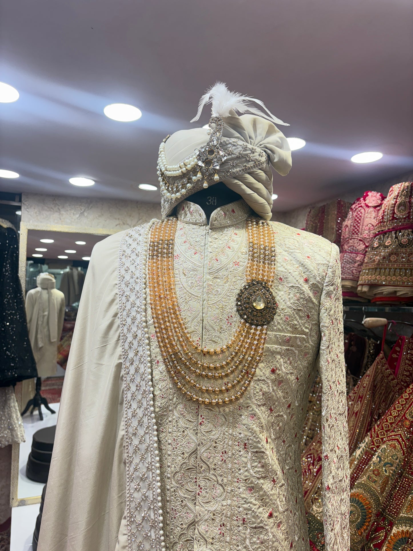 Pretty bridal peacock Lehenga sherwani combo