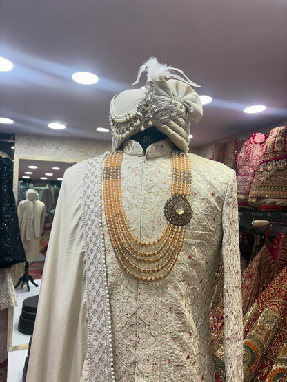 Pretty bridal peacock Lehenga sherwani combo