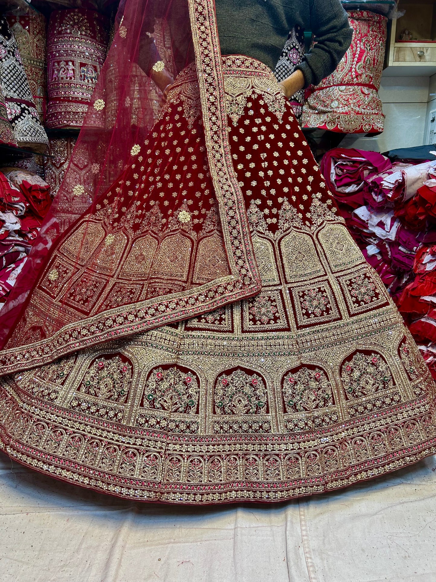 Amazing maroon khidki bridal lehenga