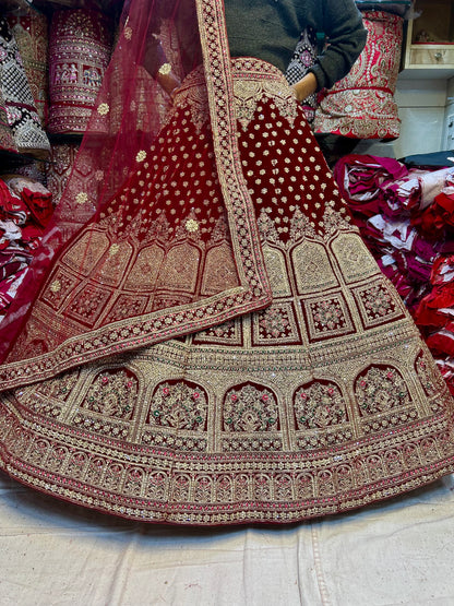 Amazing maroon khidki bridal lehenga