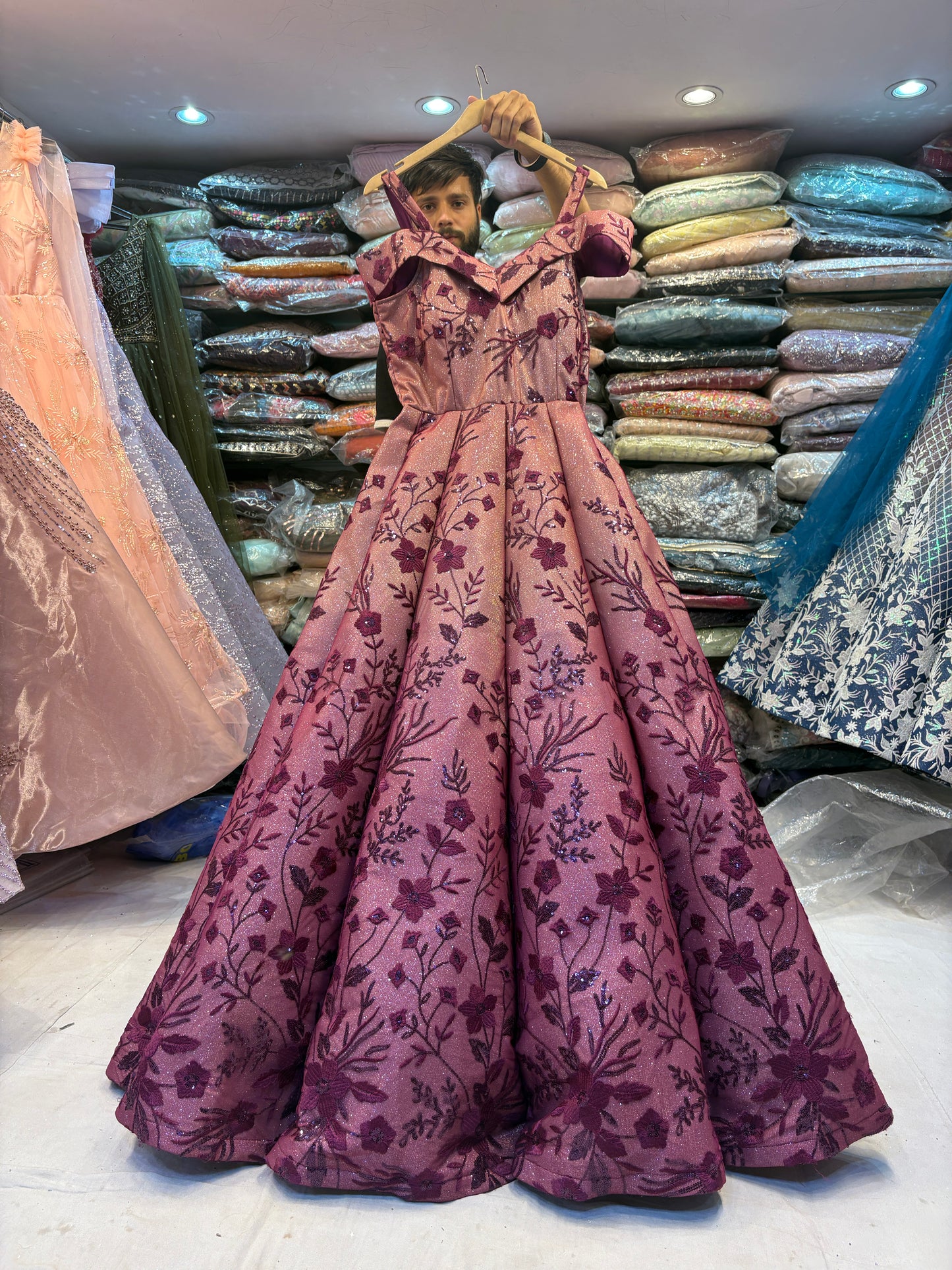 Embellished maroon peach ball gown