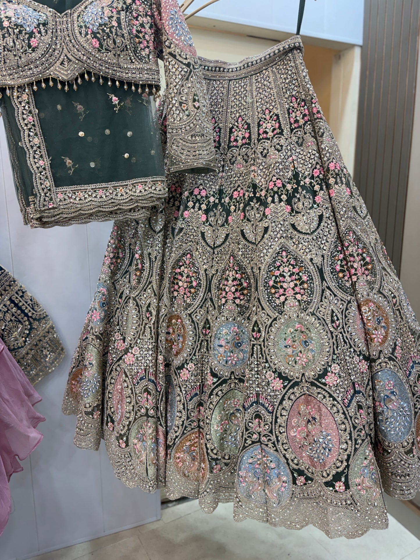 Fantastic beige peach circle peacock crop top Lehenga