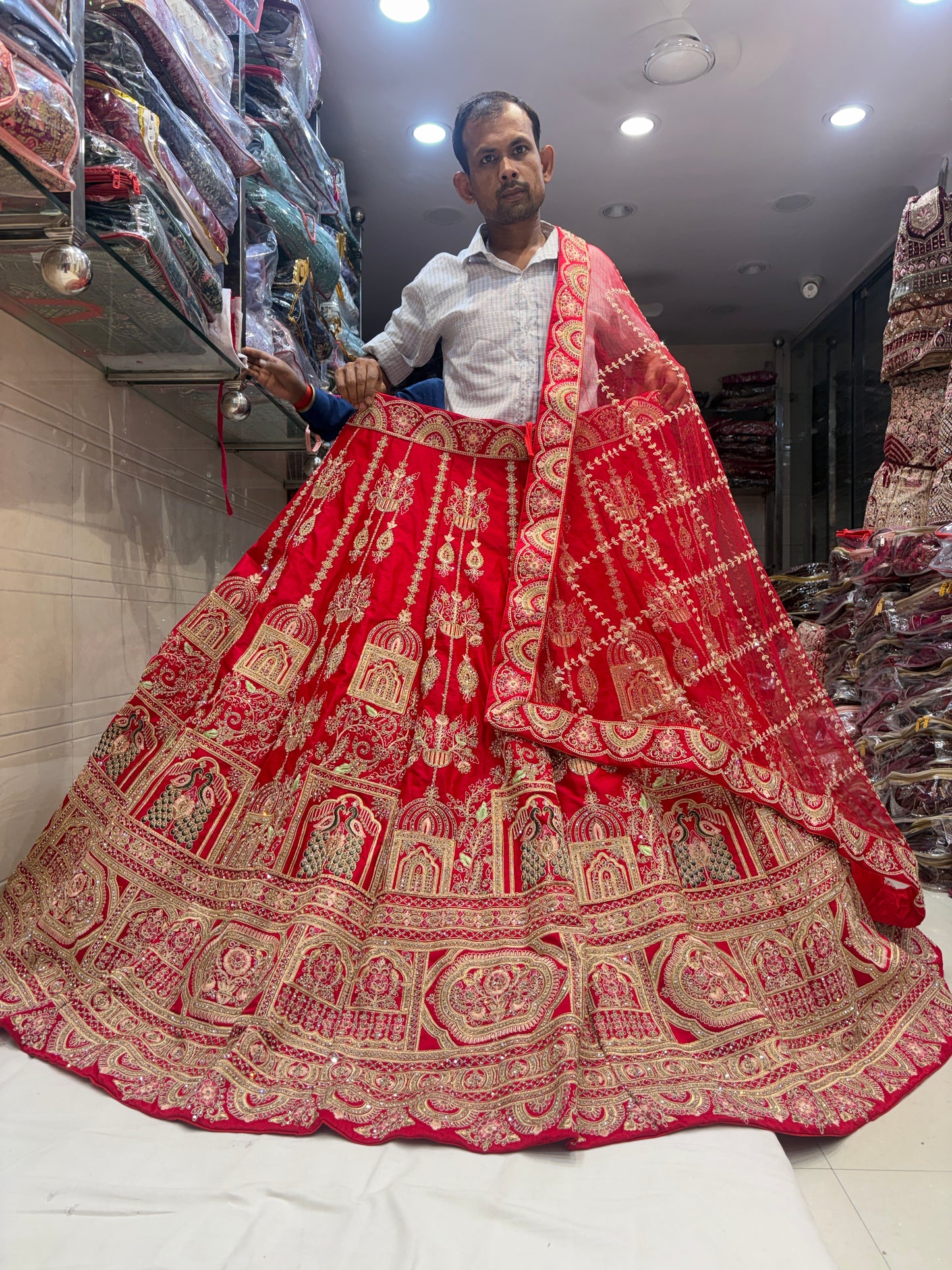 Delightful Rani pink peacock Bridal Lehenga