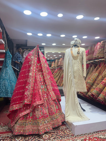 Pretty bridal peacock Lehenga sherwani combo