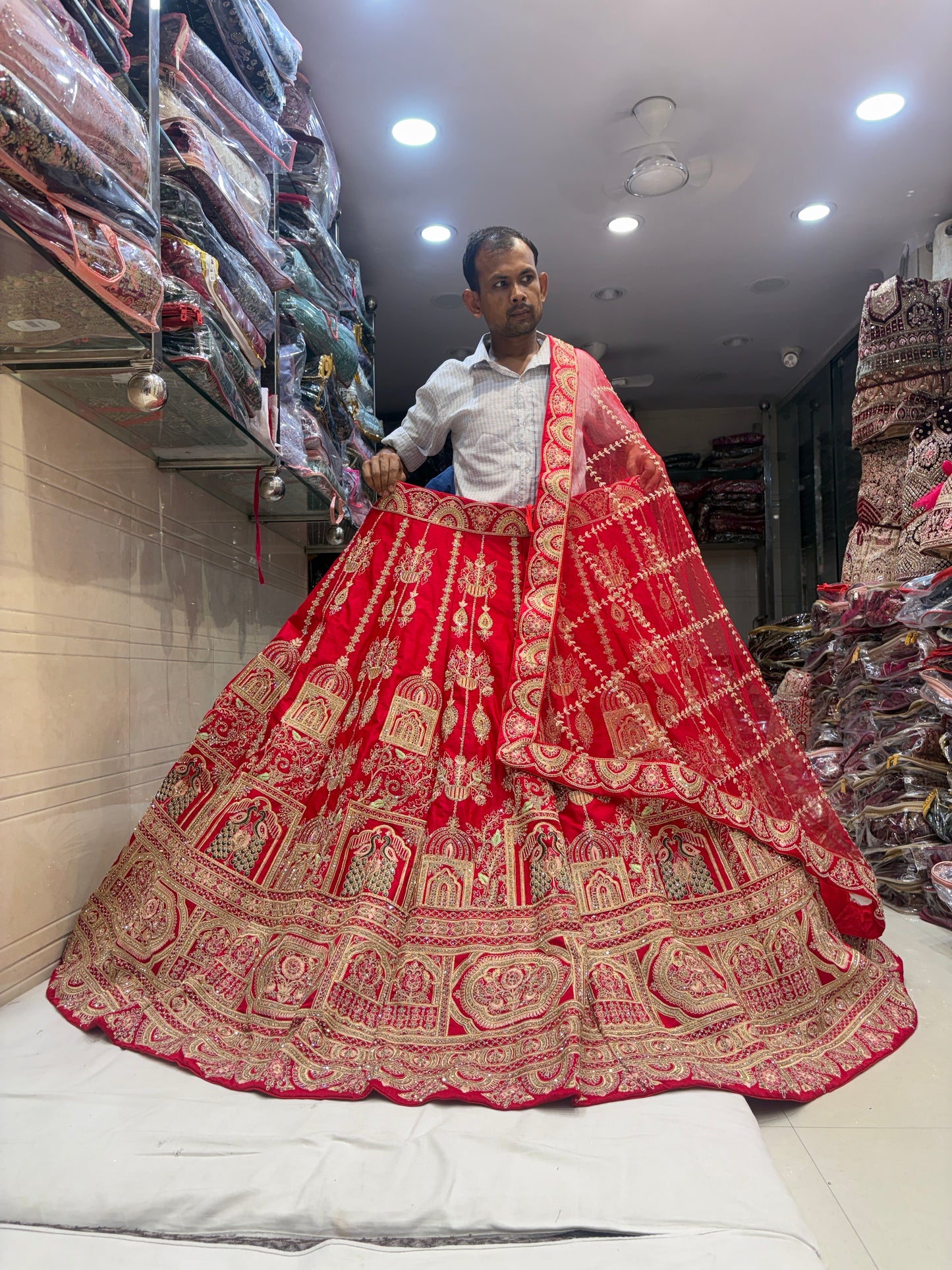 Delightful Rani pink peacock Bridal Lehenga