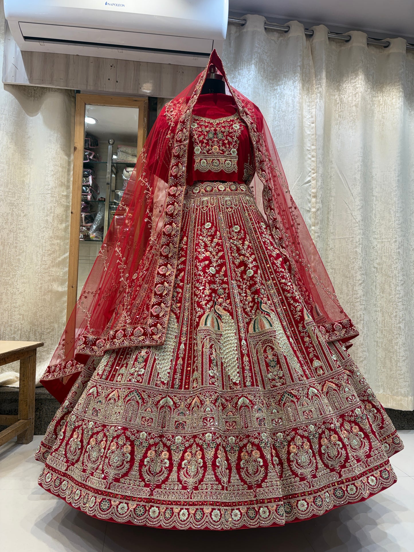 Glamorous maroon peacock bridal Lehenga