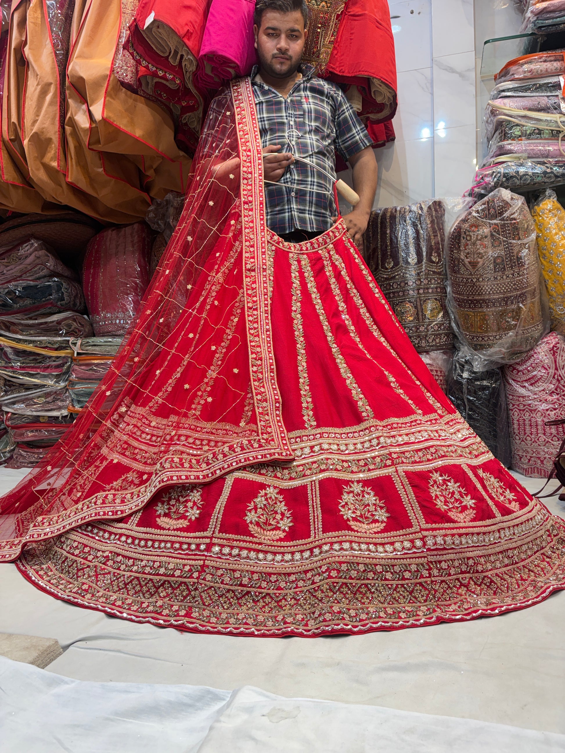 Pleasing handwork Sabyasachi silk red rani pink bridal Lehenga
