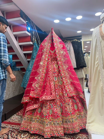 Pretty bridal peacock Lehenga sherwani combo