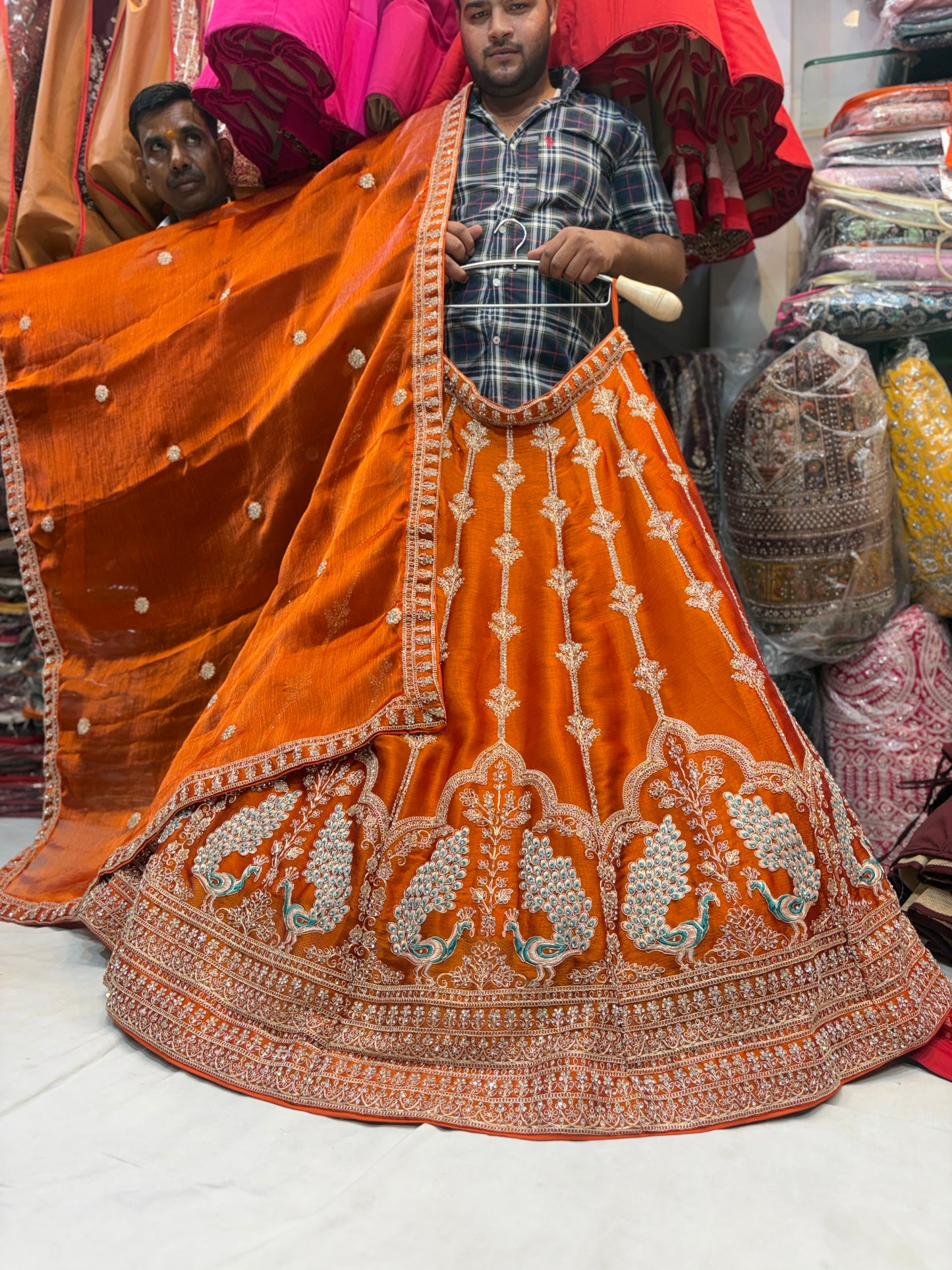 Khoobsurat orange peacock Lehenga