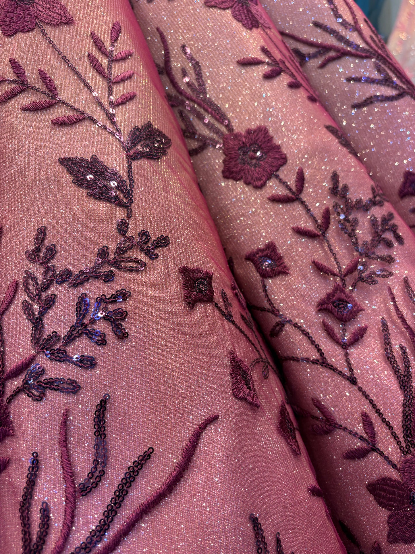 Embellished maroon peach ball gown