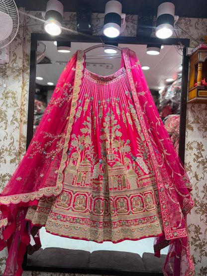 Fabulous rani pink peacock handwork bridal Lehenga