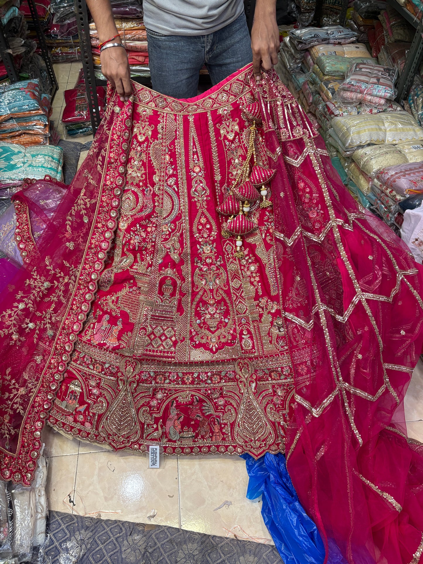 Tremendous Rani pink peacock Jaal Duptta Bridal Lehenga