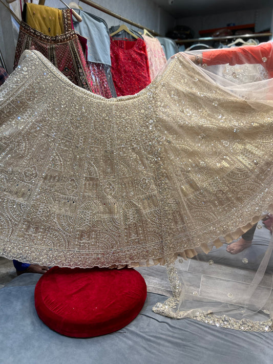 Eye catching off white golden mirror Lehenga