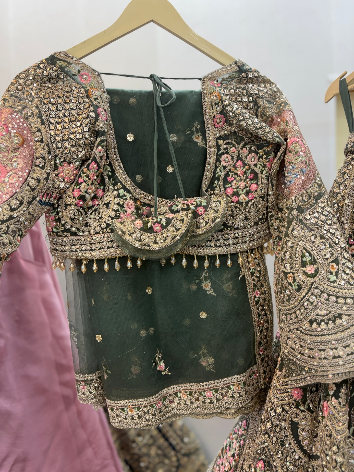 Fantastic beige peach circle peacock crop top Lehenga