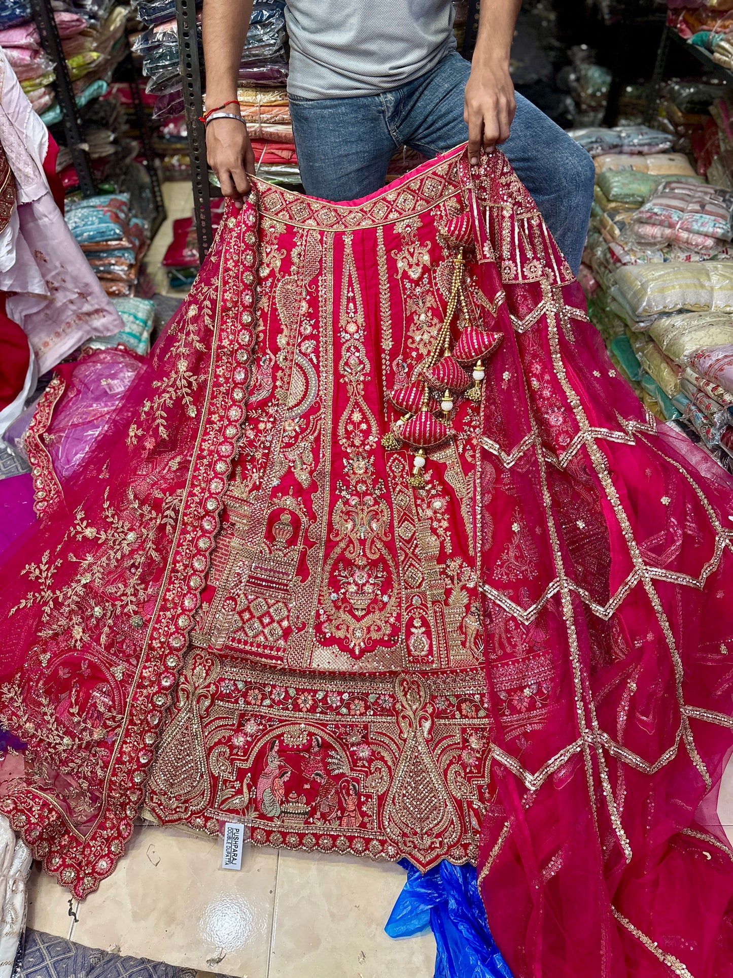 Tremendous Rani pink peacock Jaal Duptta Bridal Lehenga