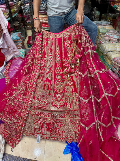 Tremendous Rani pink peacock Jaal Duptta Bridal Lehenga