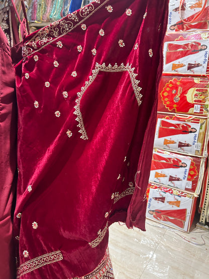 Famous red jhumka ball bridal Lehenga