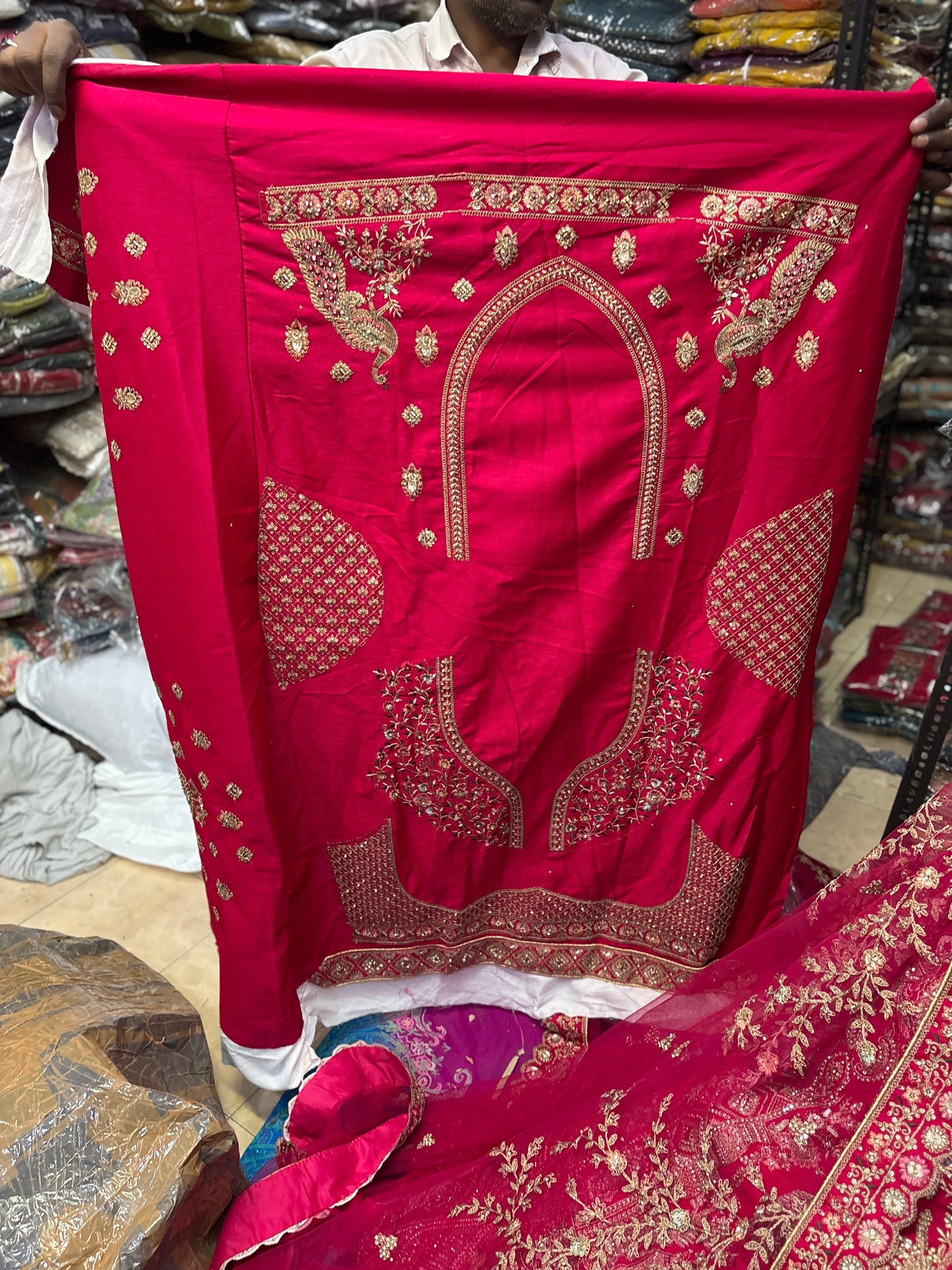Tremendous Rani pink peacock Jaal Duptta Bridal Lehenga