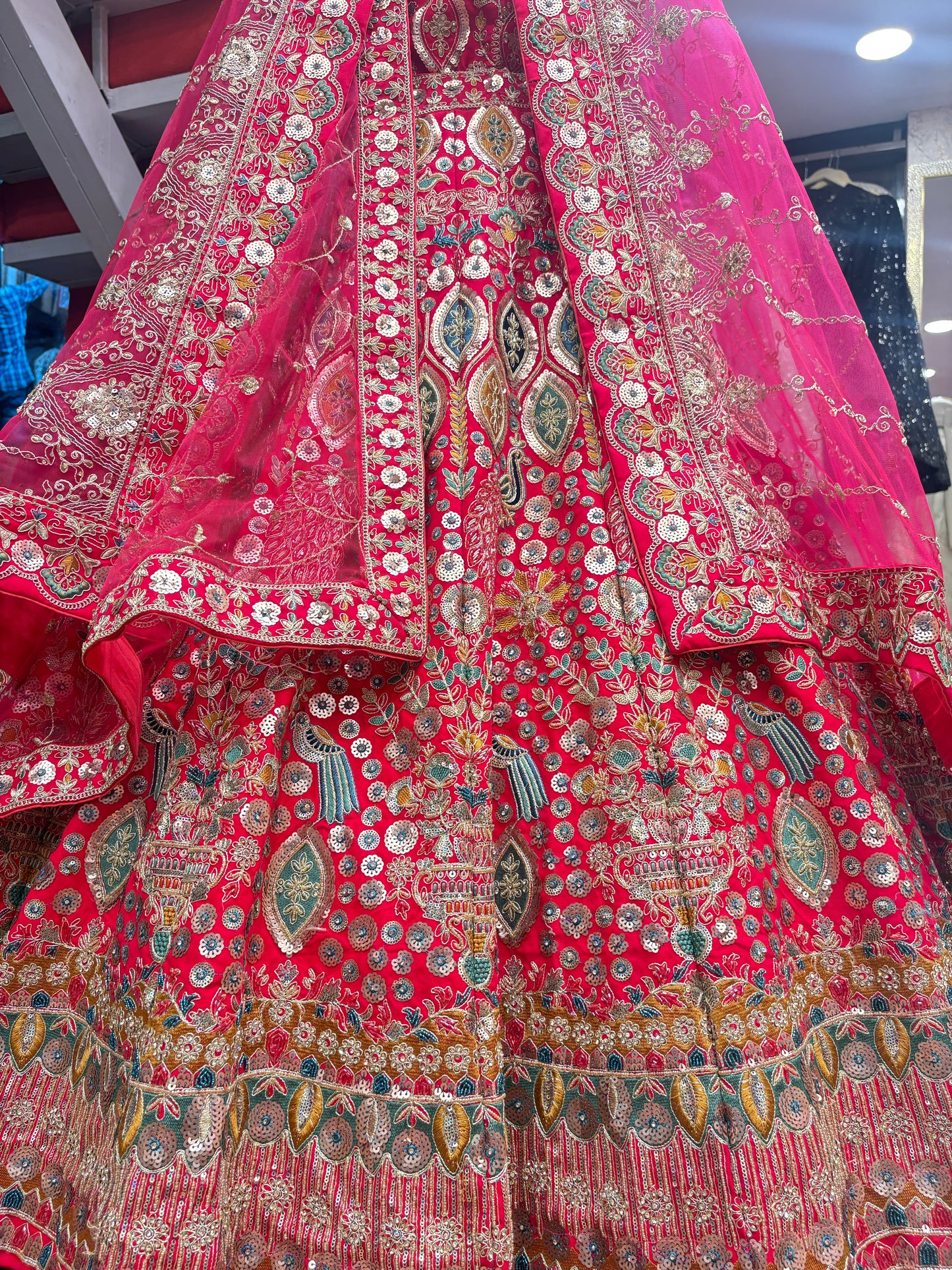 Pretty bridal peacock Lehenga sherwani combo