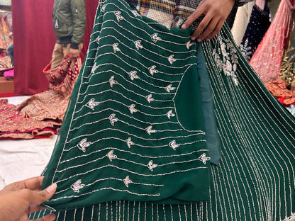 Fantástica lehenga verde oscuro