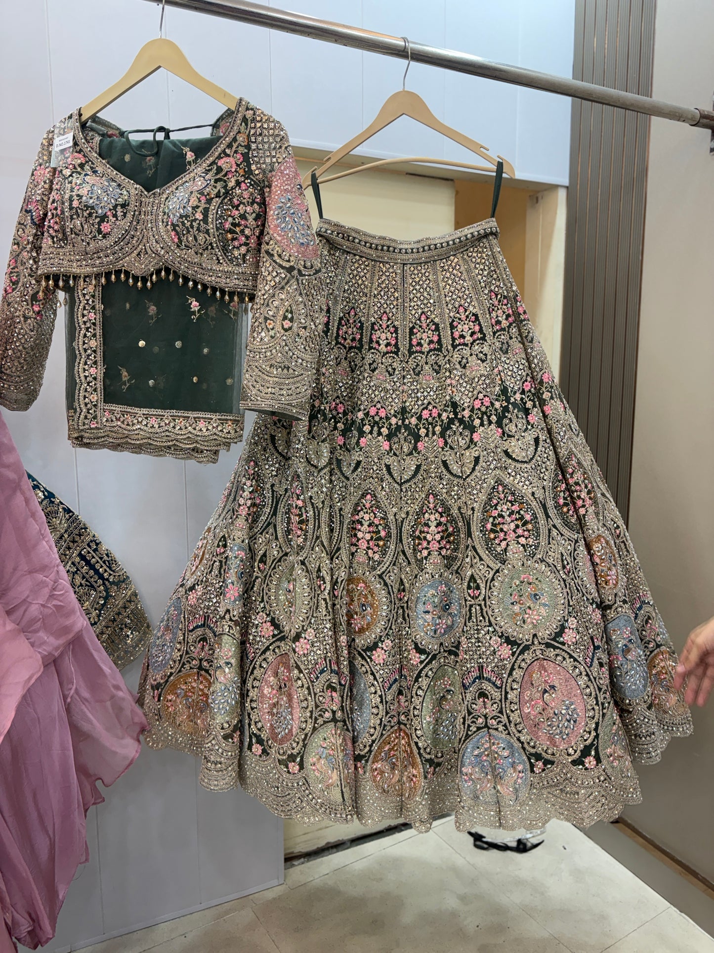 Fantastic beige peach circle peacock crop top Lehenga