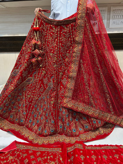 Stunning red Heavy peacock bridal lehenga