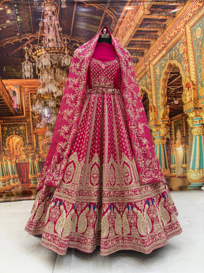 Eye catching rani pink peacock pure handwork heavy bridal Lehenga