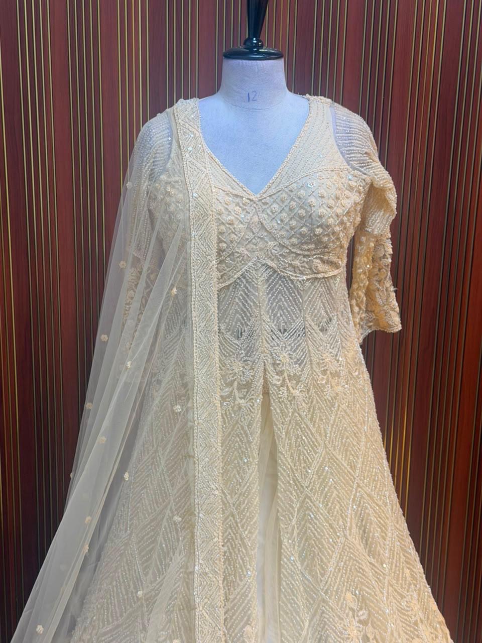 White pista color cream color crop top Lehenga