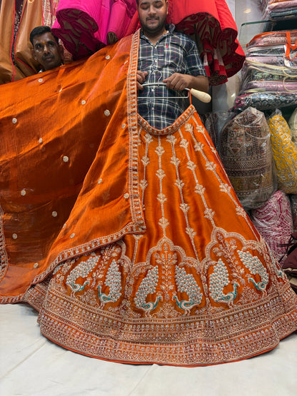 Khoobsurat orange peacock Lehenga