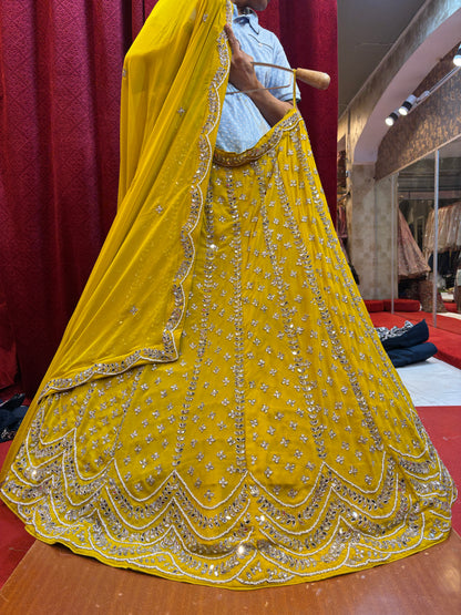 Pretty yellow haldi mehendi handwork Lehenga