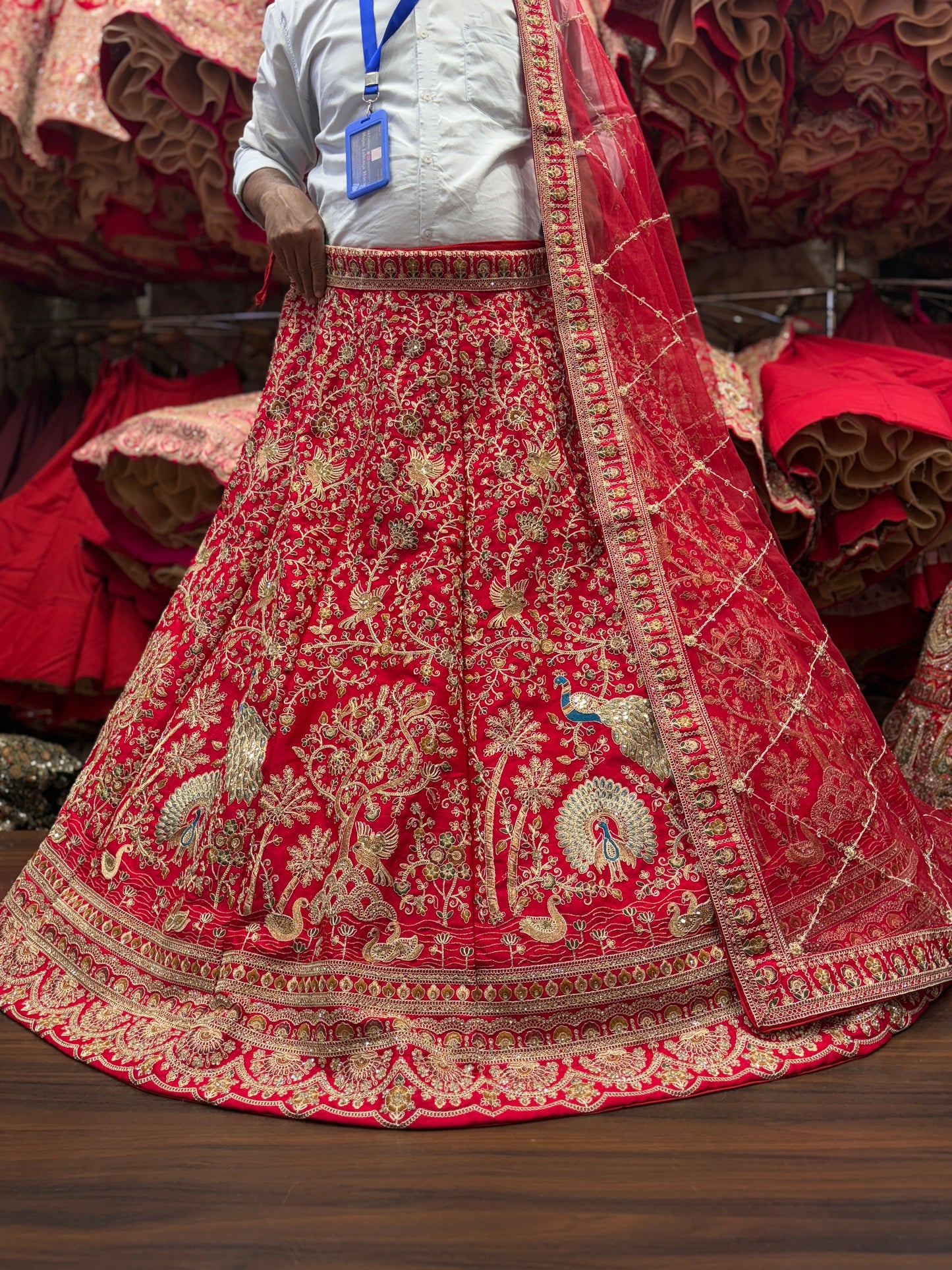 Pleasing red peacock bridal Lehenga