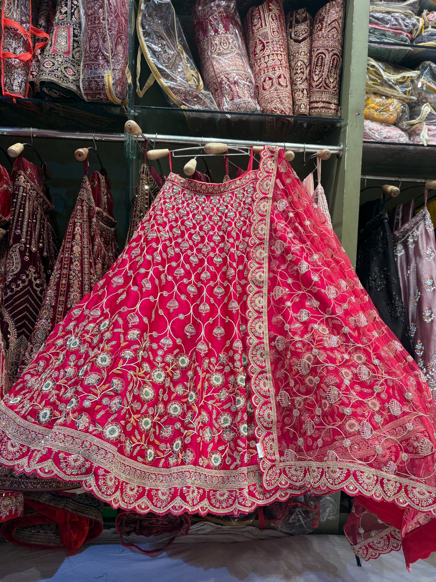 Good looking floral Rani pink Bridal Lehenga