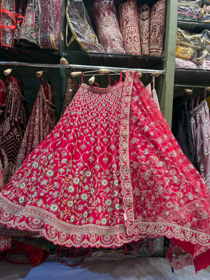 Good looking floral Rani pink Bridal Lehenga