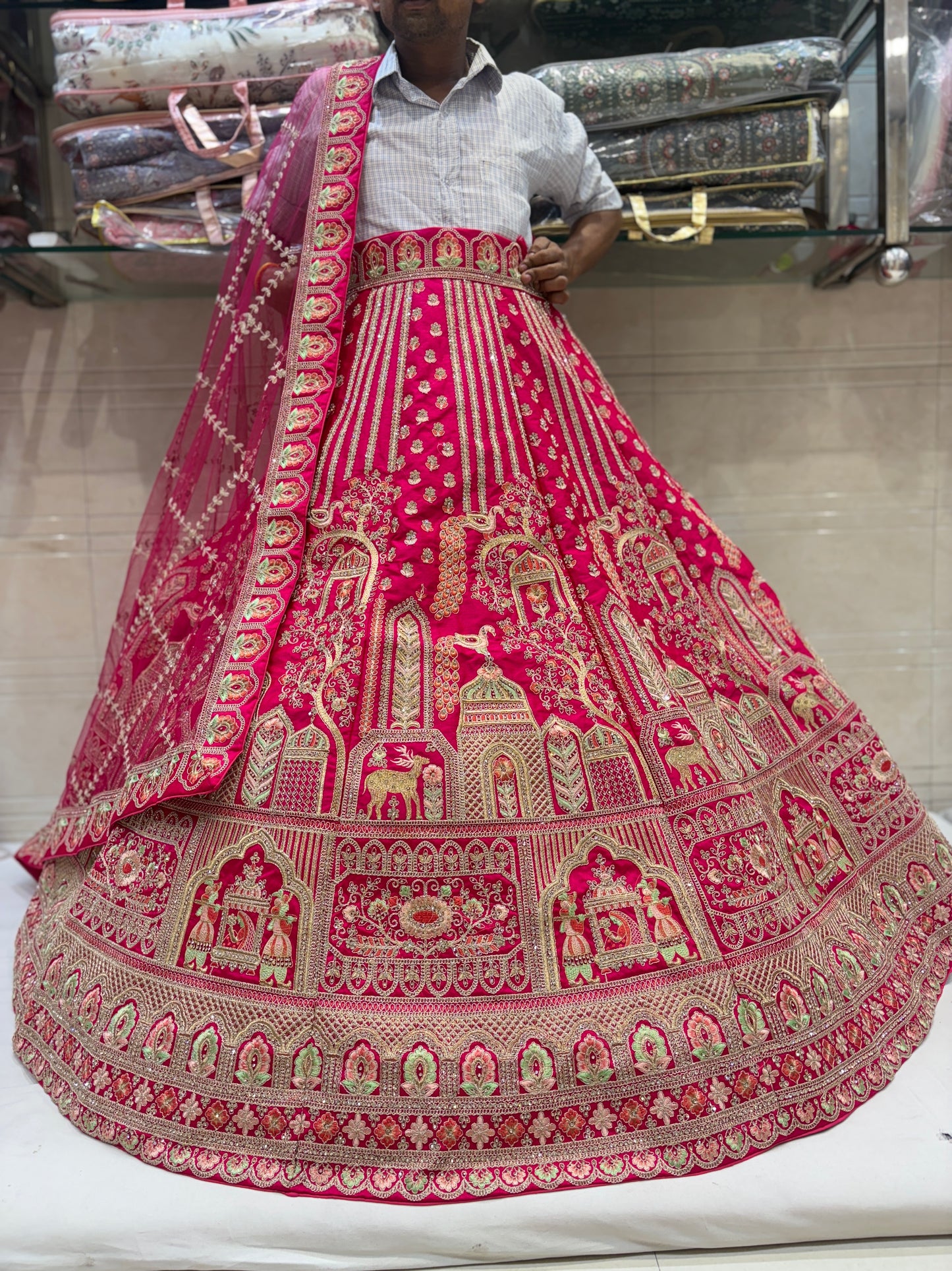 Eye catching Rani pink peacock bridal Lehenga