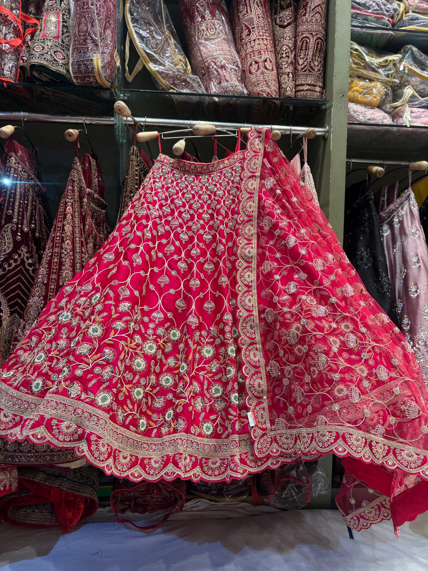 Good looking floral Rani pink Bridal Lehenga