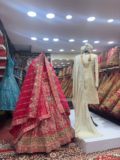 Pretty bridal peacock Lehenga sherwani combo