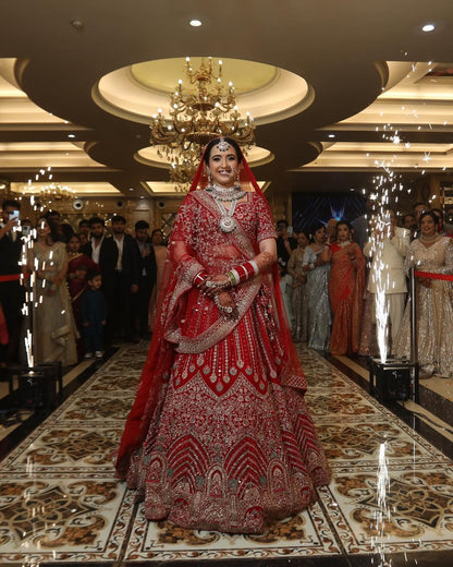 Khoobsurat jhumka red  Bridal lehenga Happy Customer