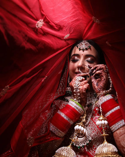 Khoobsurat jhumka red  Bridal lehenga Happy Customer