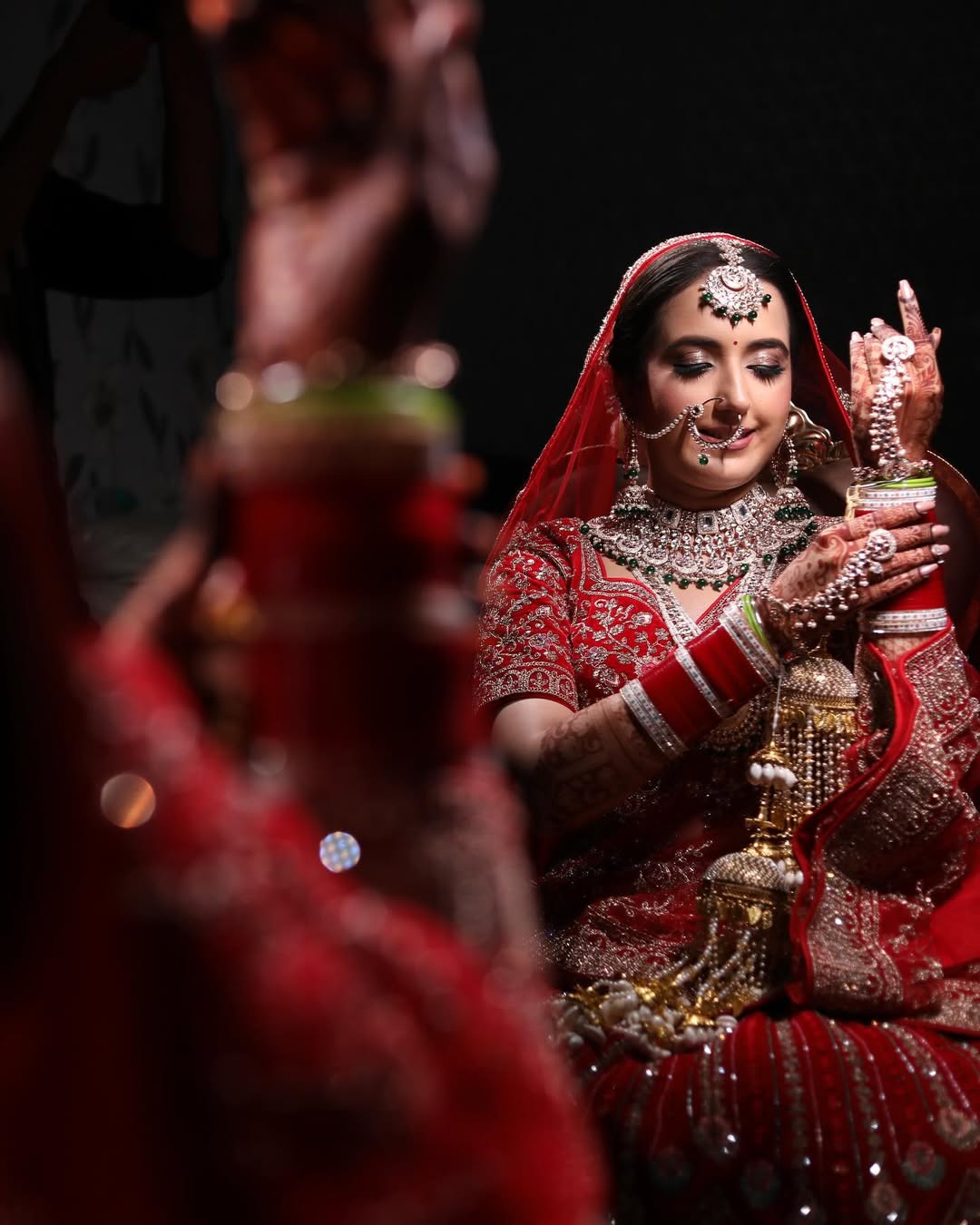 Khoobsurat jhumka red  Bridal lehenga Happy Customer