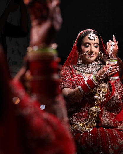Khoobsurat jhumka red  Bridal lehenga Happy Customer